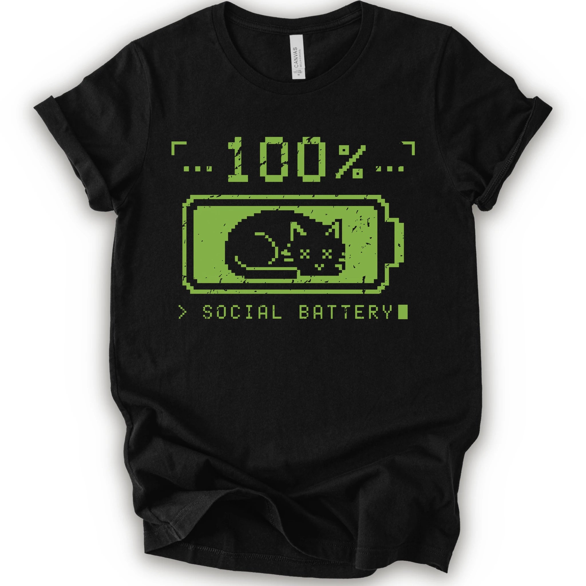 A black t-shirt with a green pixel-art graphic of a sleeping cat inside a battery icon, with the text '100% SOCIAL BATTERY'.