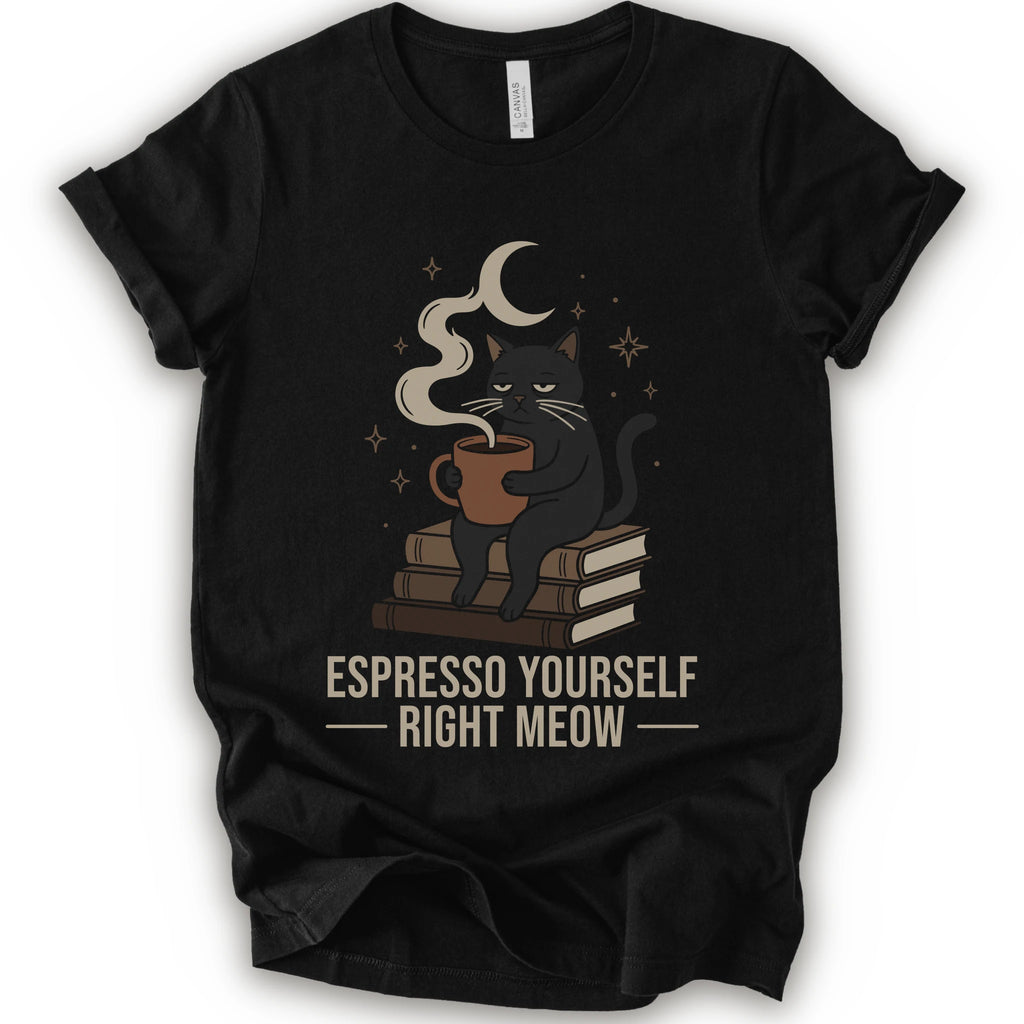 A black short-sleeve crewneck t-shirt featuring a graphic of a black cat sitting on books and holding an espresso cup, with a crescent moon and stars above. The text 'ESPRESSO YOURSELF RIGHT MEOW' is printed below in beige.