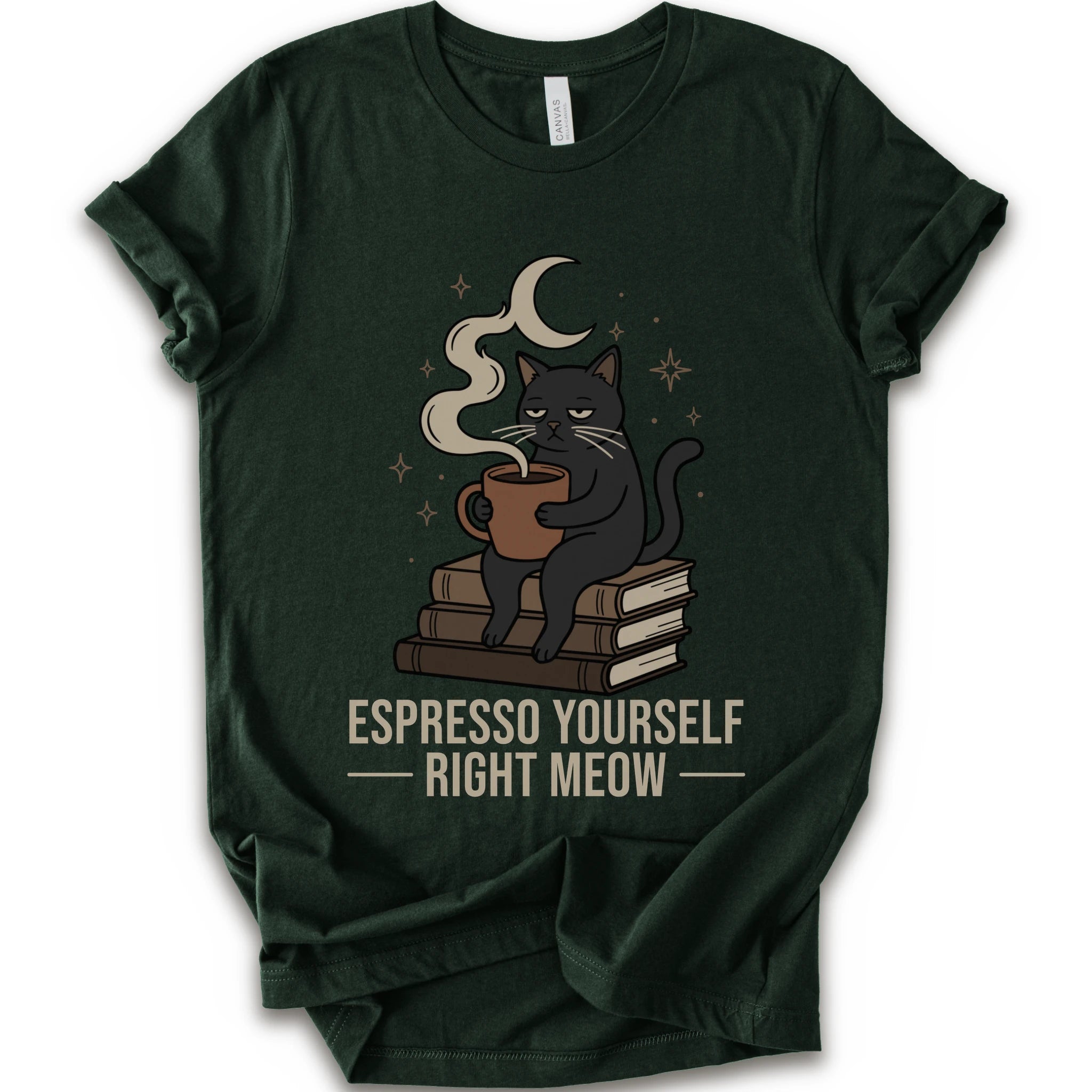 A forest short-sleeve crewneck t-shirt featuring a graphic of a black cat sitting on books and holding an espresso cup, with a crescent moon and stars above. The text 'ESPRESSO YOURSELF RIGHT MEOW' is printed below in beige.