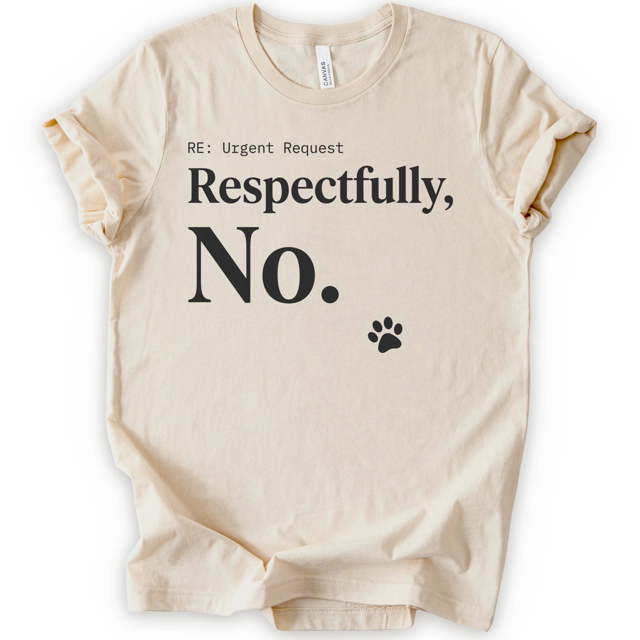 A natural short-sleeve t-shirt with a humorous graphic print that reads 'RE: Urgent Request Respectfully, No.' in black text, accompanied by a small paw print icon.