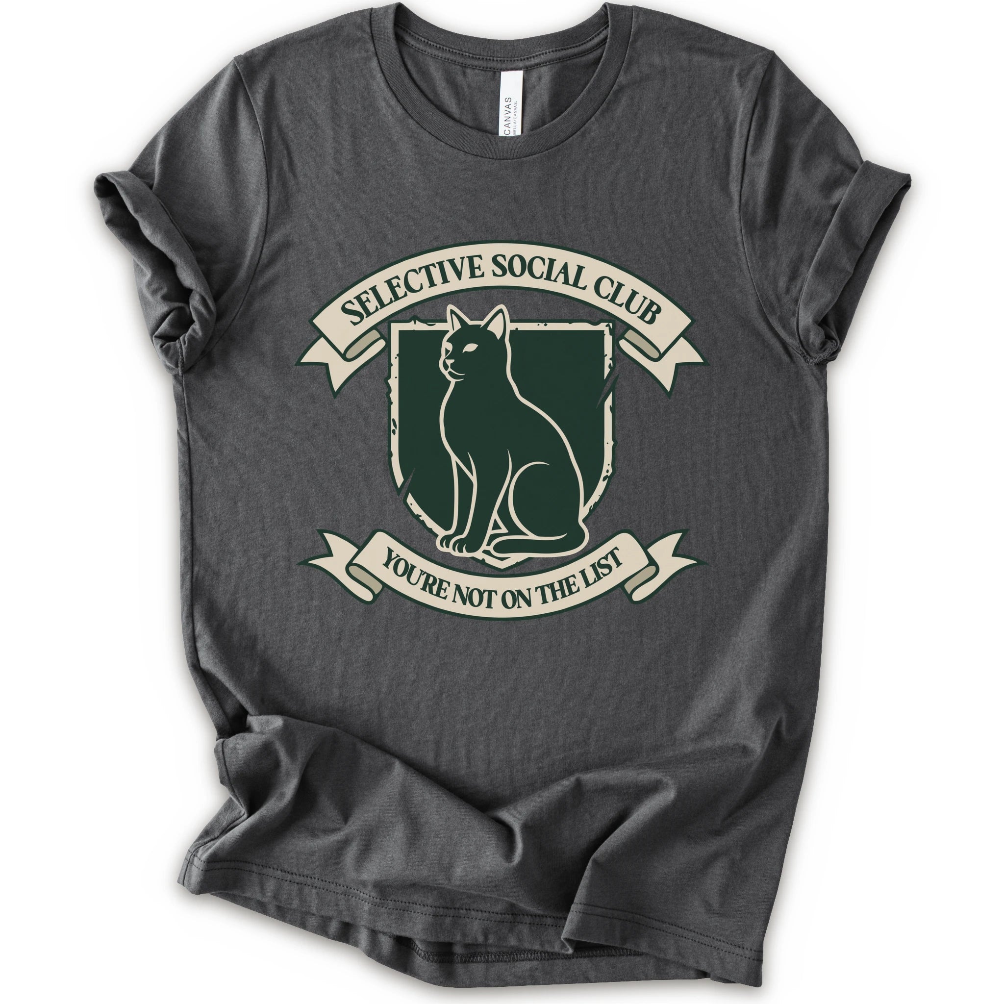 A asphalt short-sleeve crewneck t-shirt with a distressed graphic of a cat inside a crest, surrounded by banners reading 'SELECTIVE SOCIAL CLUB' and 'YOU'RE NOT ON THE LIST'.