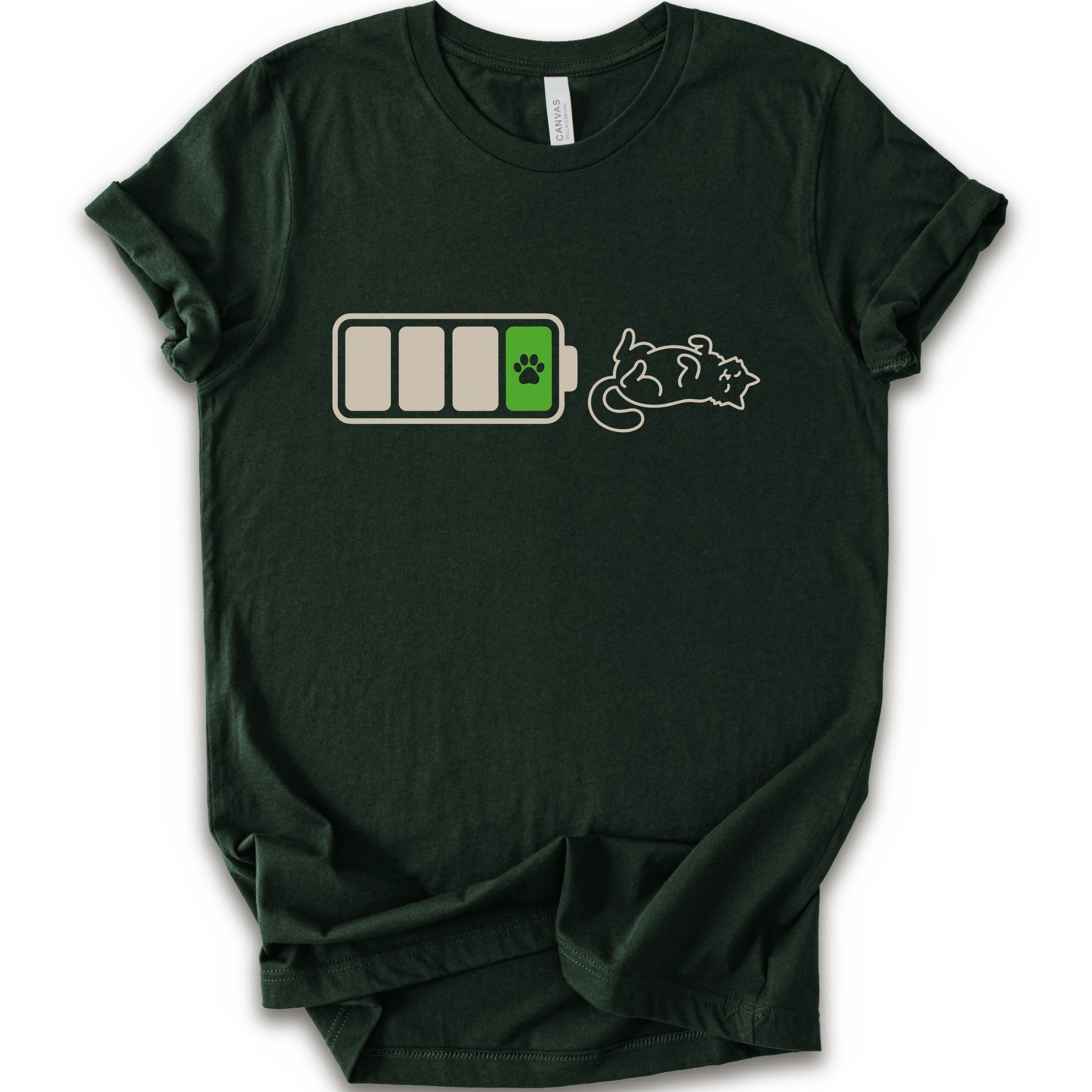 A forest short-sleeve crewneck t-shirt featuring a graphic of a battery with three bars, a green battery cell with a black paw print, and a white line-art illustration of a sleeping cat.