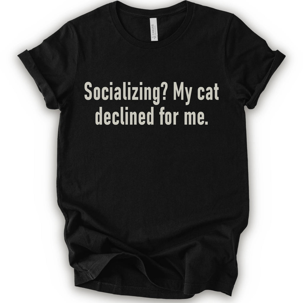 Black graphic t-shirt with text “Socializing? My cat declined for me.” in large cream text for an introvert cat T-shirt