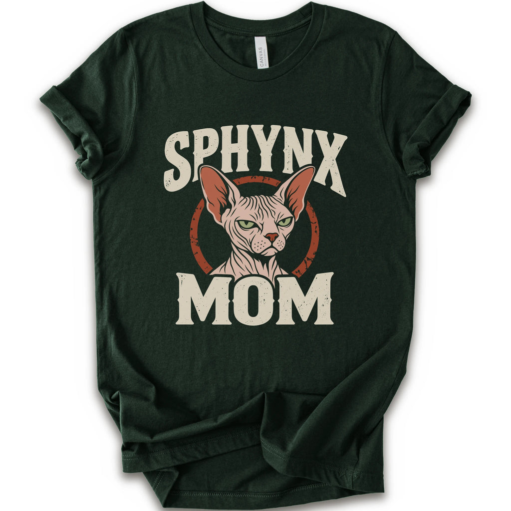 A forest short-sleeve crewneck t-shirt with a graphic print of a Sphynx cat and the text 'SPHYNX MOM' in distressed cream lettering.