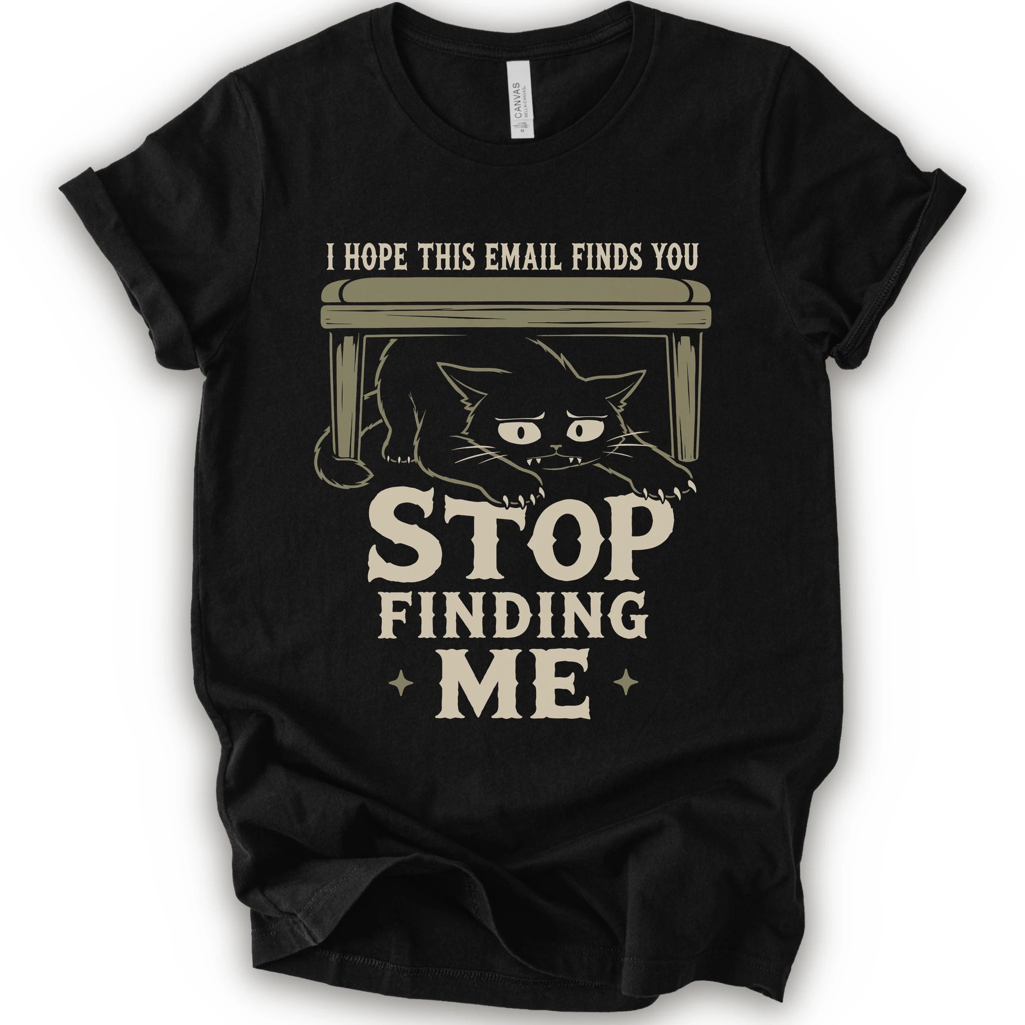  Black t-shirt with a black cat crouching under a desk with “I Hope This Email Finds You” and “Stop Finding Me” distressed text