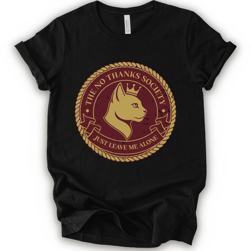A black short-sleeve t-shirt with a circular graphic print on the front. The graphic features a golden-yellow cat profile wearing a crown, surrounded by a rope border and the text 'THE NO THANKS SOCIETY' and 'JUST LEAVE ME ALONE' in a maroon background.