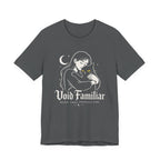 Asphalt grey Tee with Woman hugging a black cat beneath a crescent moon with “Void Familiar” and “Weird. Tired. Perfectly Fine.” text