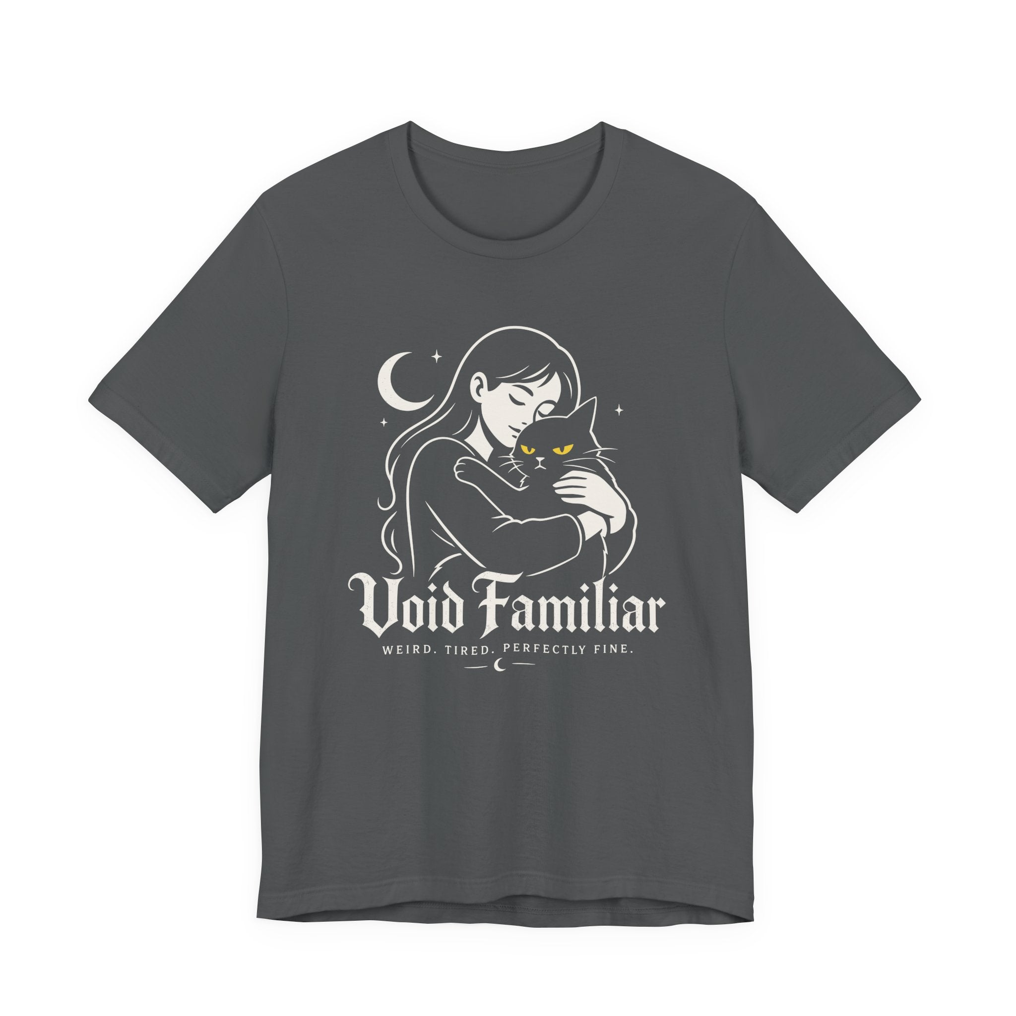 Asphalt grey Tee with Woman hugging a black cat beneath a crescent moon with “Void Familiar” and “Weird. Tired. Perfectly Fine.” text