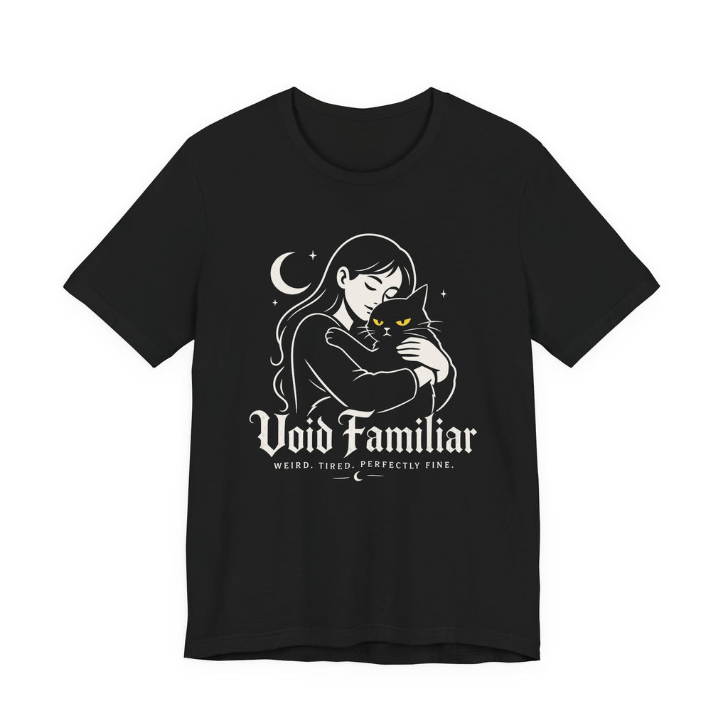 Black Tee with Woman hugging a black cat beneath a crescent moon with “Void Familiar” and “Weird. Tired. Perfectly Fine.” text