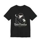 Black Tee with Woman hugging a black cat beneath a crescent moon with “Void Familiar” and “Weird. Tired. Perfectly Fine.” text