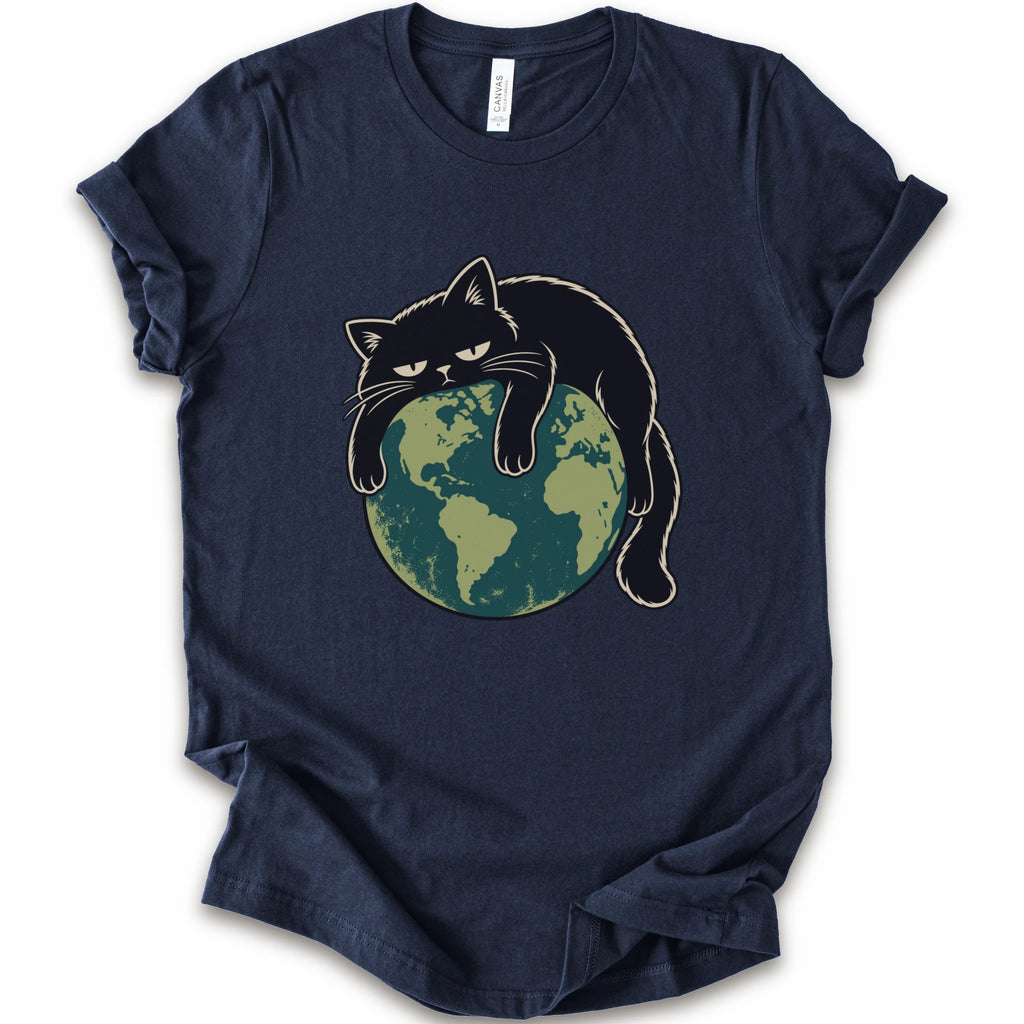 A navy short-sleeve crewneck t-shirt featuring a graphic of a grumpy black cat draped over a green and blue globe.