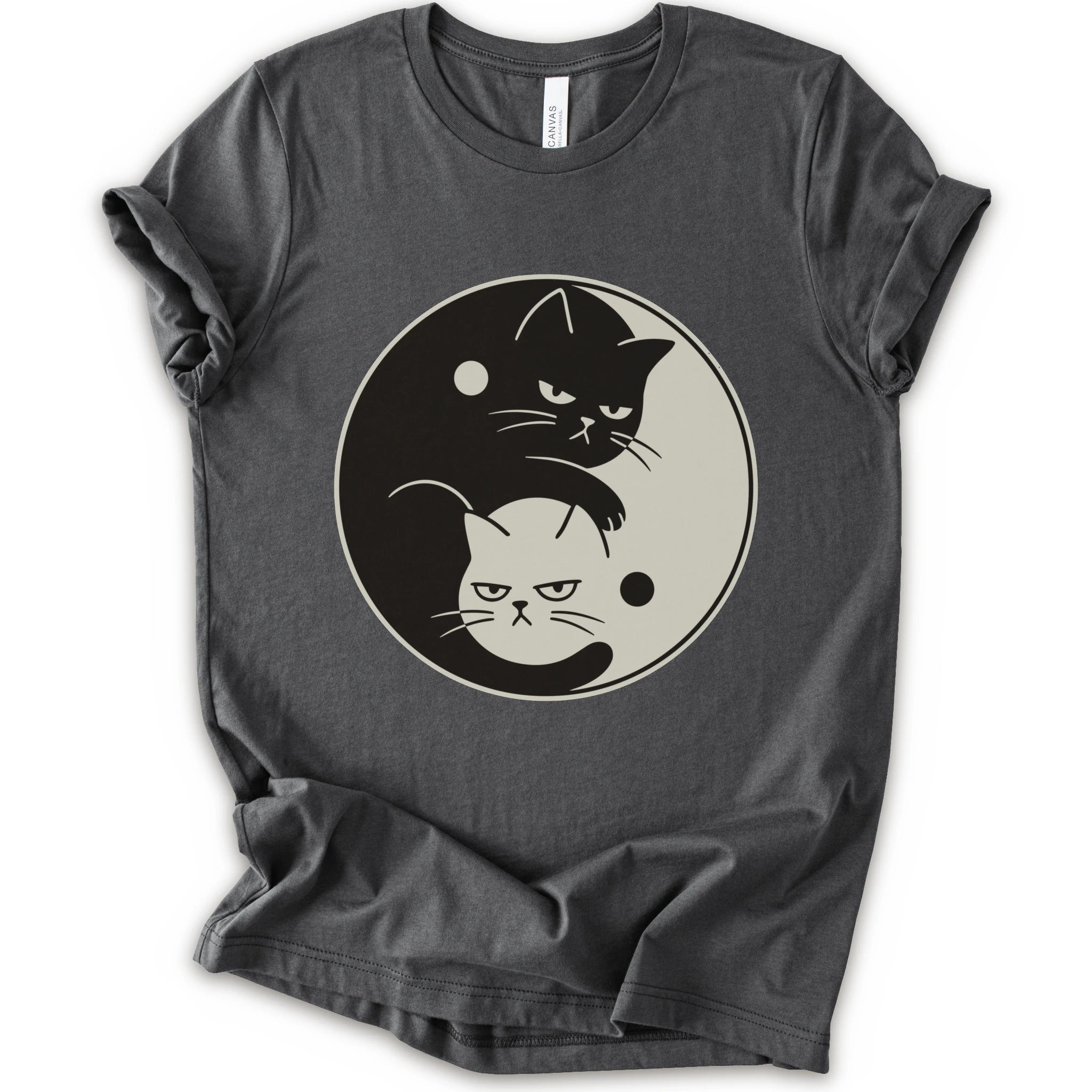 Asphalt graphic t-shirt with two unimpressed cats, one black and one light, arranged in a yin-yang symbol