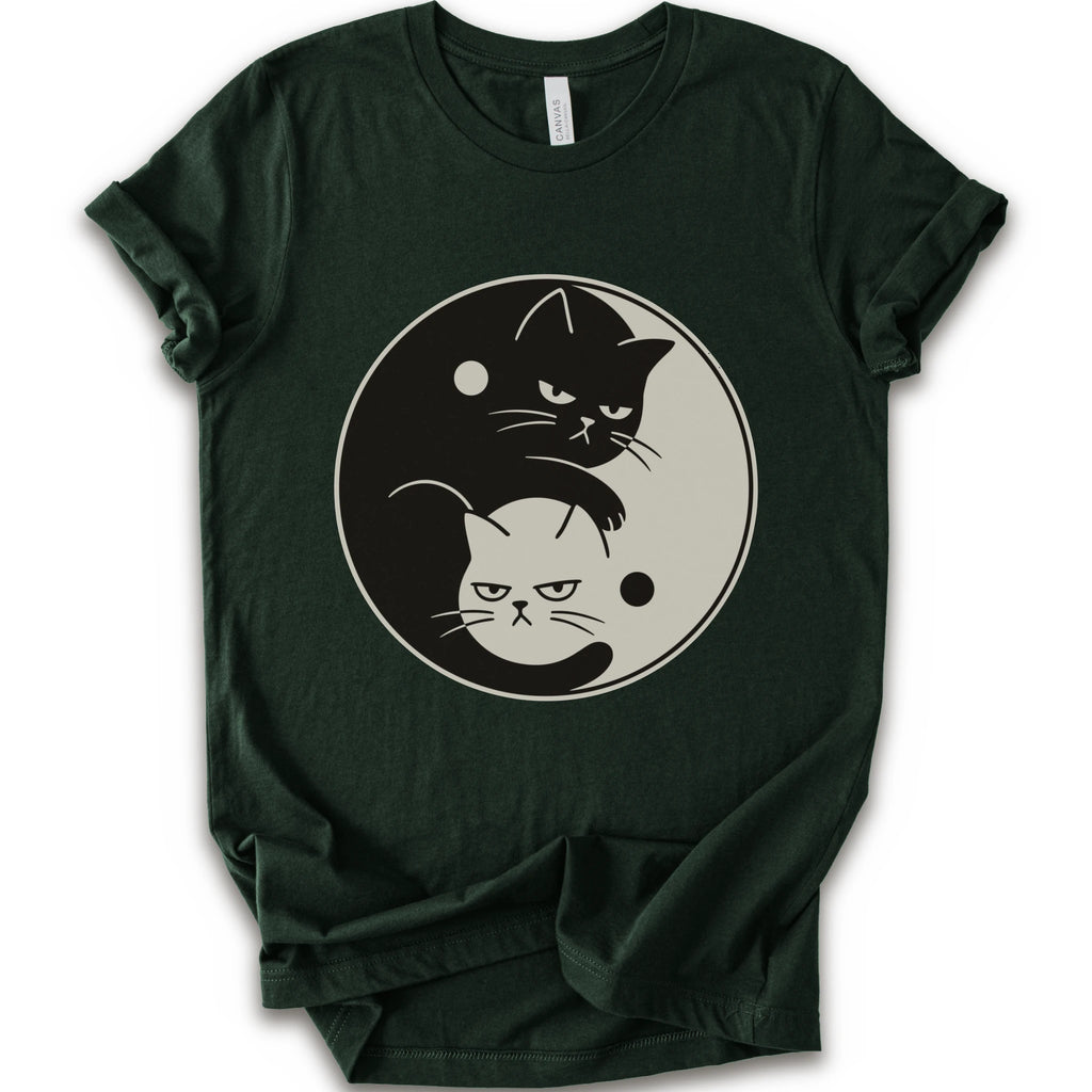 Forest graphic t-shirt with two unimpressed cats, one black and one light, arranged in a yin-yang symbol